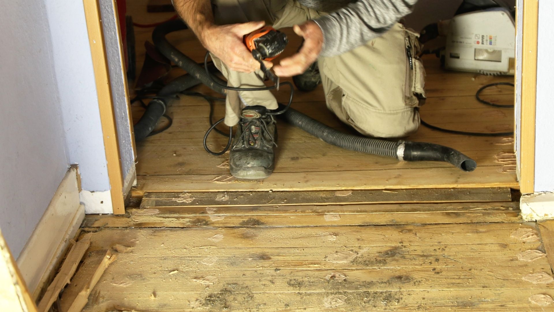 During wood floor polishing & restoration in a Dubai apartment.