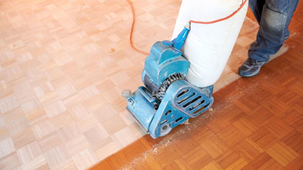 During wood floor polishing & restoration in a Dubai apartment.