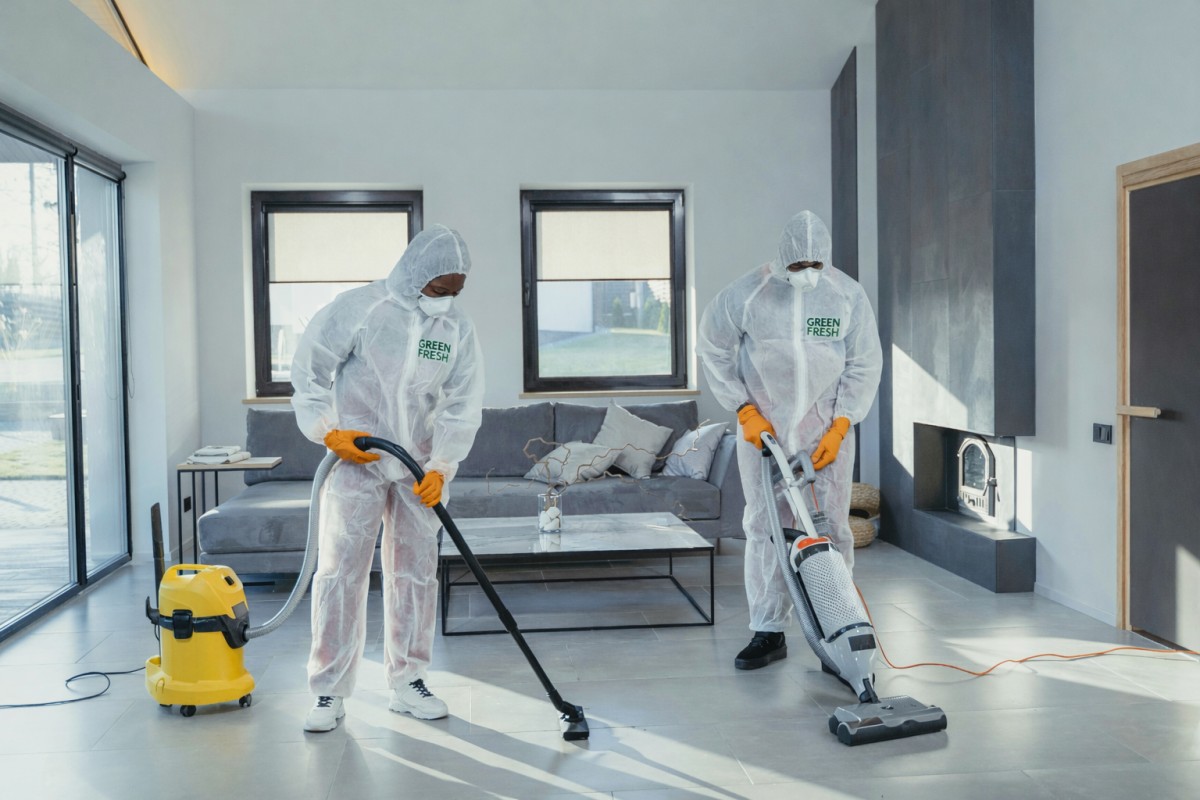 Professional disinfection and sanitization services in Dubai technician cleaning apartment