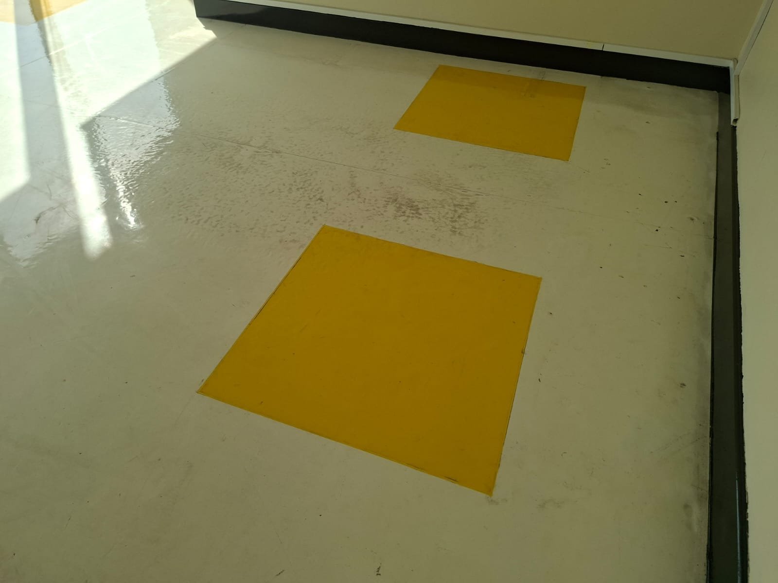 Worn and marked school office vinyl floor before professional cleaning in Al Barsha Dubai
