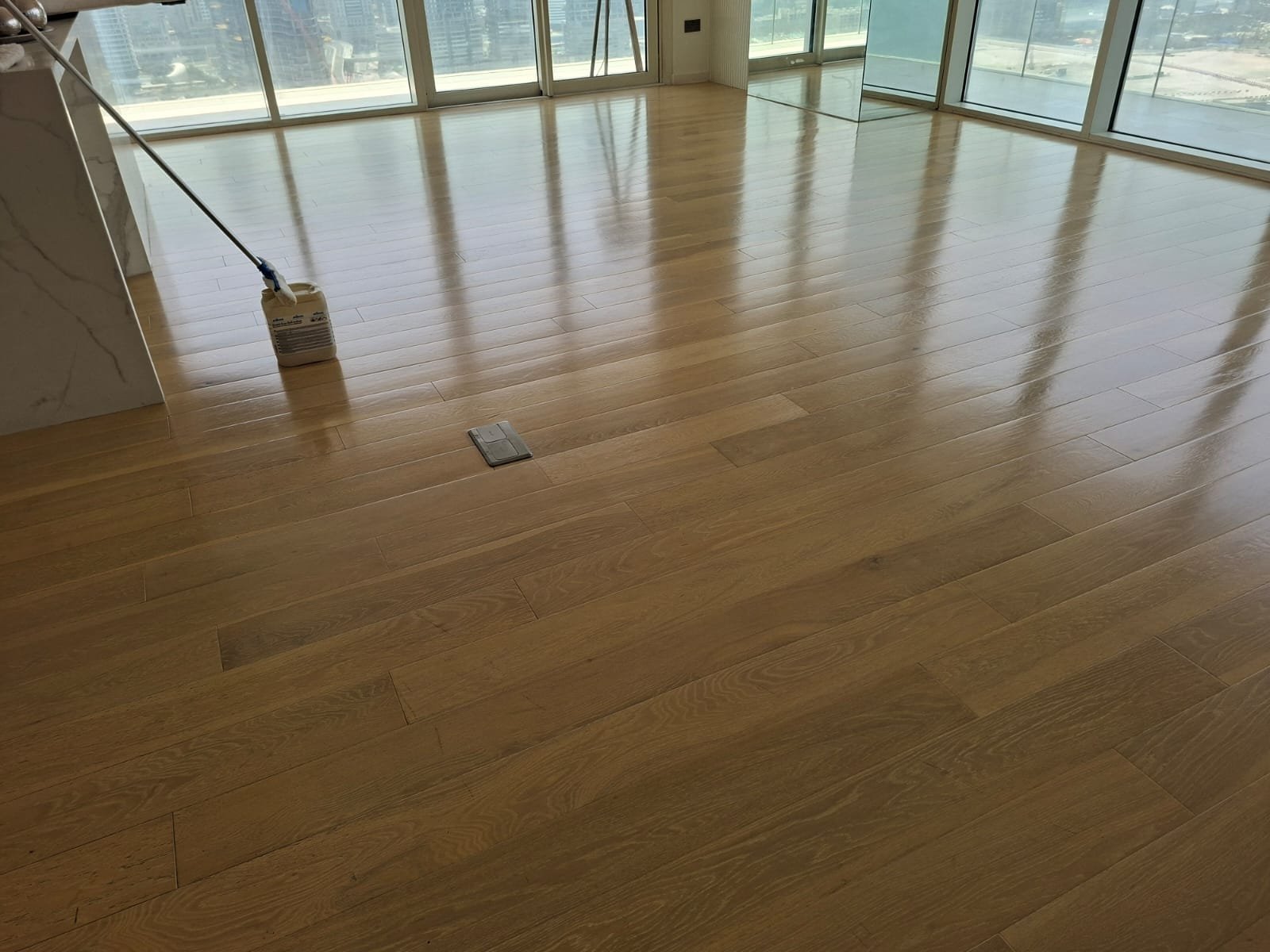 Wood floor after professional cleaning and refreshing treatment at Sunrise Bay Dubai
